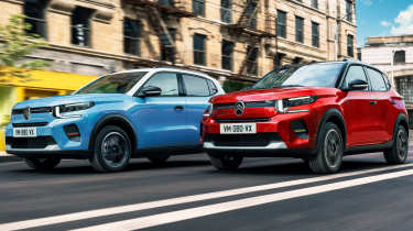 New Citroen C3 supermini - red and blue cars dynamically driving