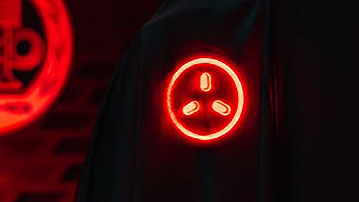 Detailed view of the sleek LED taillight bar teaser on the Mercedes-AMG GT SUV
