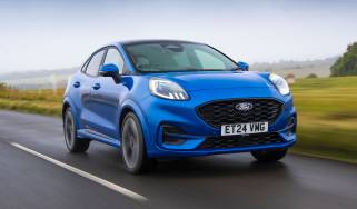 Facelifted Ford Puma being driven in the UK - front tracking 