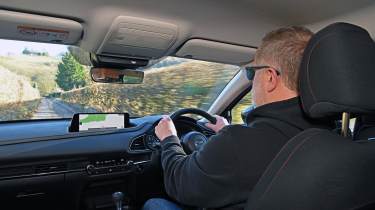 Auto Express executive editor Paul Adam driving the Mazda CX-30