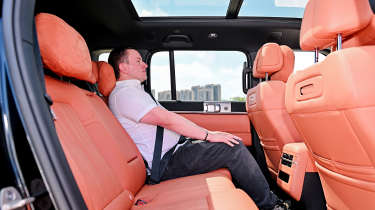 New BYD Ti7 - rear seats being sat in by Auto Express senior content editor Shane Wilkinson