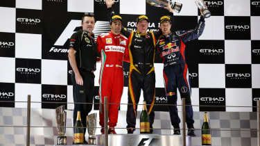 Fernando Alonso, Kimi Raikkonen and Sebastian Vettel on the podium