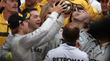 Nico Rosberg celebrates with his team