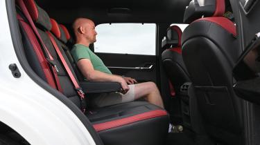 Auto Express chief reviewer sitting in the KGM Actyon&#039;s rear seat