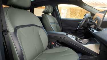 BMW iX4 50 - front seats