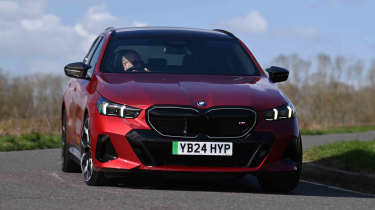 BMW i5 Touring - front cornering