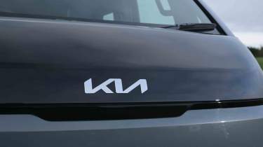 Kia PV5 - 'Kia' bonnet badge detail