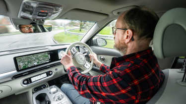 Auto Express chief sub-editor Andy Pringle driving the Genesis GV60