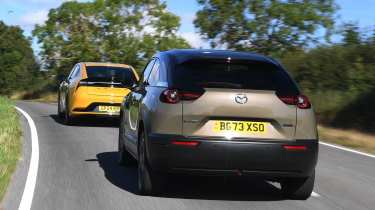 Toyota Prius PHEV and Mazda MX-30 R-EV - rear tracking 