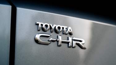 Toyota CH-R+ - badge