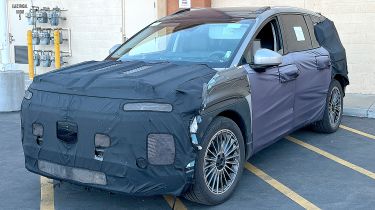 Hyundai Ioniq 9 test car (camouflaged) - front facing left