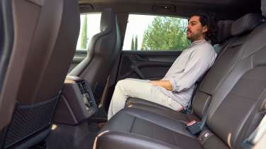 Jordan Katsianis sat in the Porsche Cayenne Electric