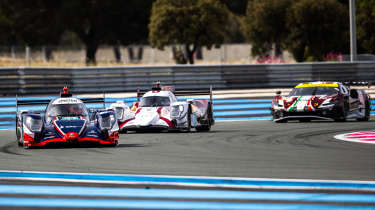 Le Mans racing cars cornering