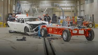 Crash tested Honda Civic being inspected by Horiba Mira technicians