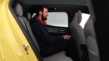 Volvo EX30 Single Motor Extended Range Ultra - rear seats being sat in by Sam Naylor 
