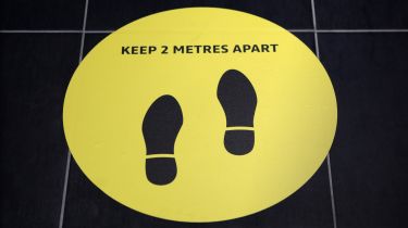 &#039;Keep 2 metres apart&#039; - Covid social distancing floor sign