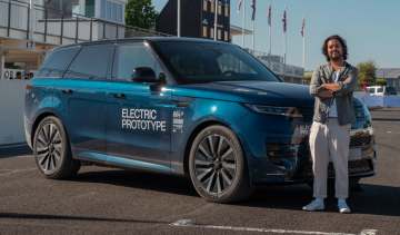 Jordan Katsianis with the Range Rover Sport EV prototype