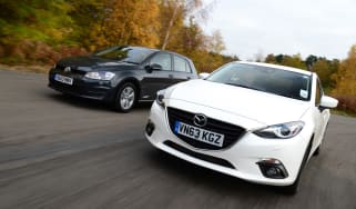 Volkswagen Golf vs Mazda 3 2013 main