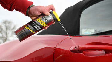 Auto Express Product Awards 2026 - products editor Tom Barnard using Product of the Year, Rocket TT maintenance spray