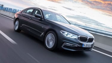New BMW 5 Series - front sunset