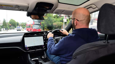 Auto Express creative director Darren Wilson driving our long–term Lexus RZ