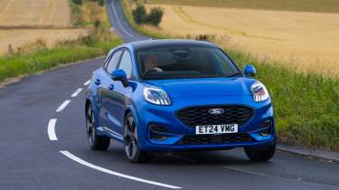 Facelifted Ford Puma being driven in the UK - front cornering 