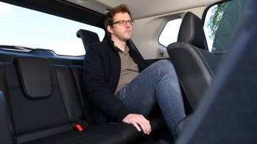 Max Adams sitting in the Nissan X-Trail N-Trek e-Power