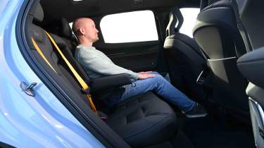 Polestar 3 - rear seats with Chief reviewer, Alex Ingram