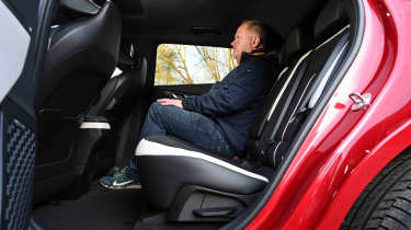 Kia EV6 - rear seats with Auto Express Executive director, Paul Adam
