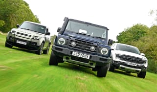 Land Rover Defender, Ineos Grenadier and Ford Ranger Raptor - front action