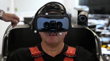 Steve Sutcliffe wear VR headset in the Dynisma driving simulator