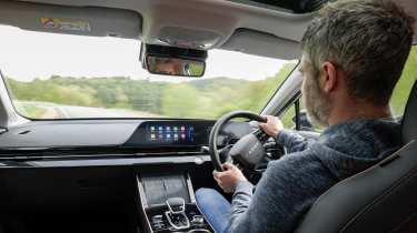 2024 Omoda 5 prototype - interior driving shot with Auto Express deputy editor, Richard Ingram