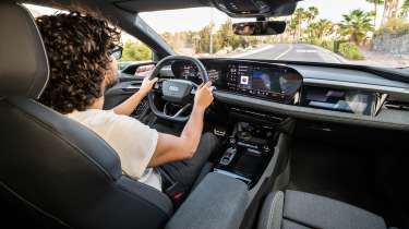 Jordan Katsianis driving the Audi A6 e-tron