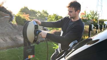 Chinese hybrid SUV mega test - car being plugged in