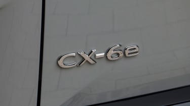 Mazda CX-6e - rear badge
