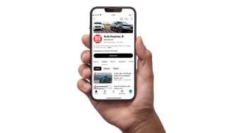 Smartphone showing the Auto Express website