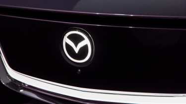 Mazda CX-6e - Mazda badge