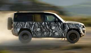 Land Rover Defender OCTA - side action