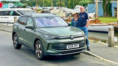 VW Tiguan eTSI - front by river