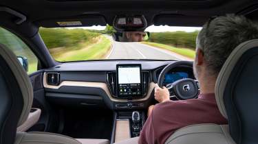 Auto Express deputy editor Richard Ingram driving the Volvo XC60 B5 facelift