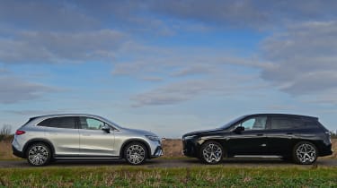 BMW iX and Mercedes EQE SUV - face-to-face static