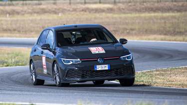 Auto Express Summer Tyre Test 2025 - Volkswagen Golf GTI undergoing dry weather corner handling tests, front 