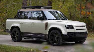 Land Rover Defender pick-up - front angled white