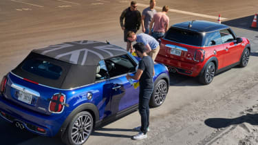 MINI Convertible blue and red parked