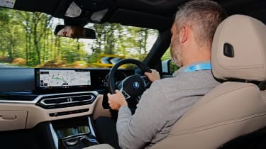 Auto Express deputy editor Richard Ingram driving the BMW i4 eDrive35 M Sport
