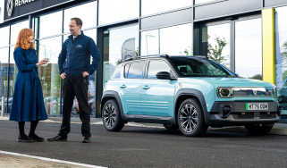 Auto Express pictures editor Dawn Grant and Renault sales executive Jamie Collis standing next to the Renault 4