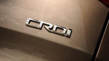 Kia Sportage 2.0 CRDi KX-3 AWD badge