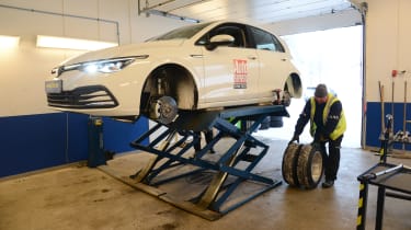 VW Golf on workshop lift