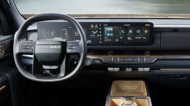 Kia Tasman - steering wheel and infotainment 