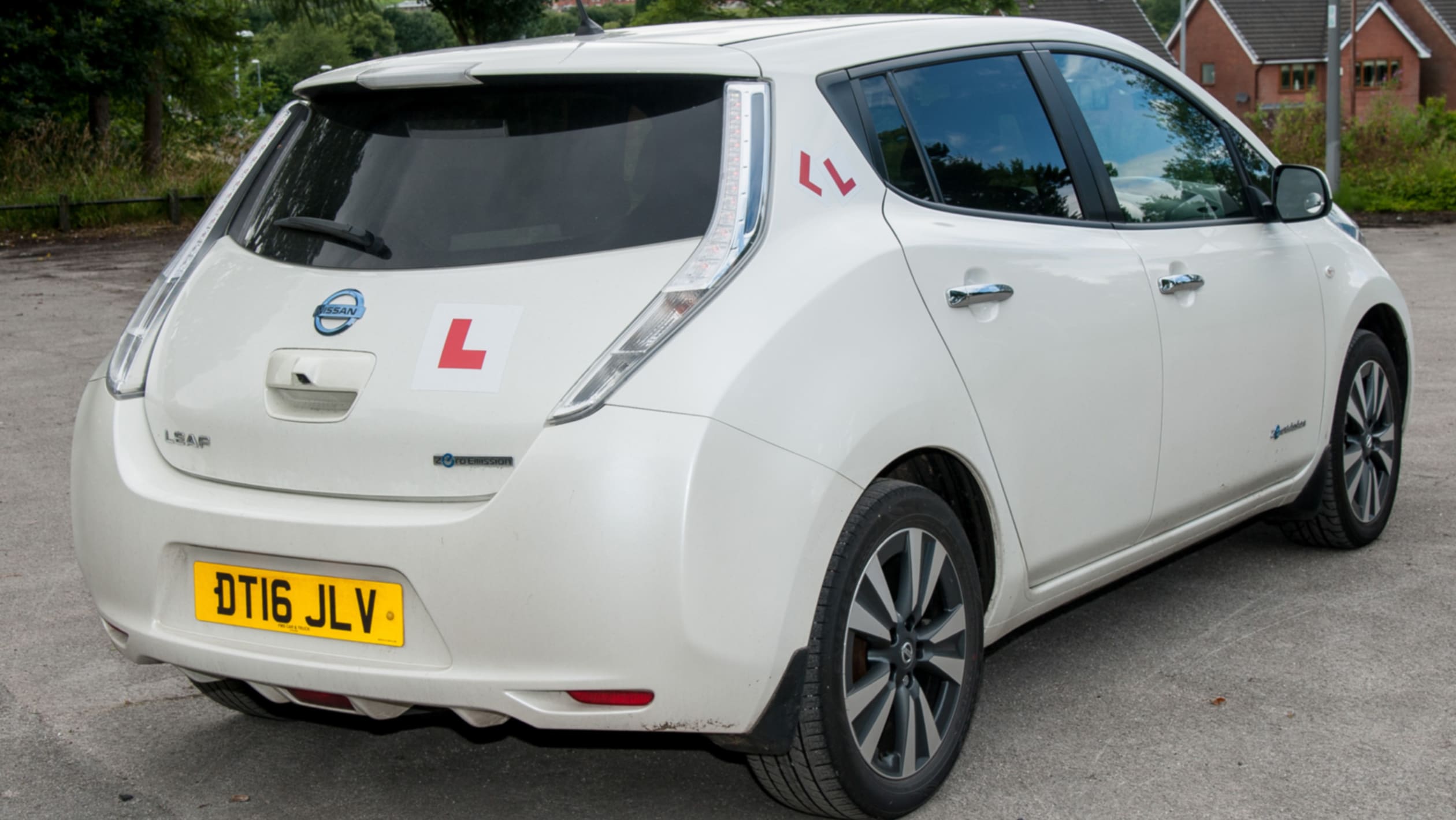 Electric car driving school learning to drive in an EV pictures